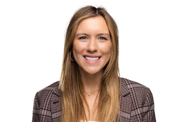 Woman's smiling portrait after her teeth whitening cosmetic dentistry